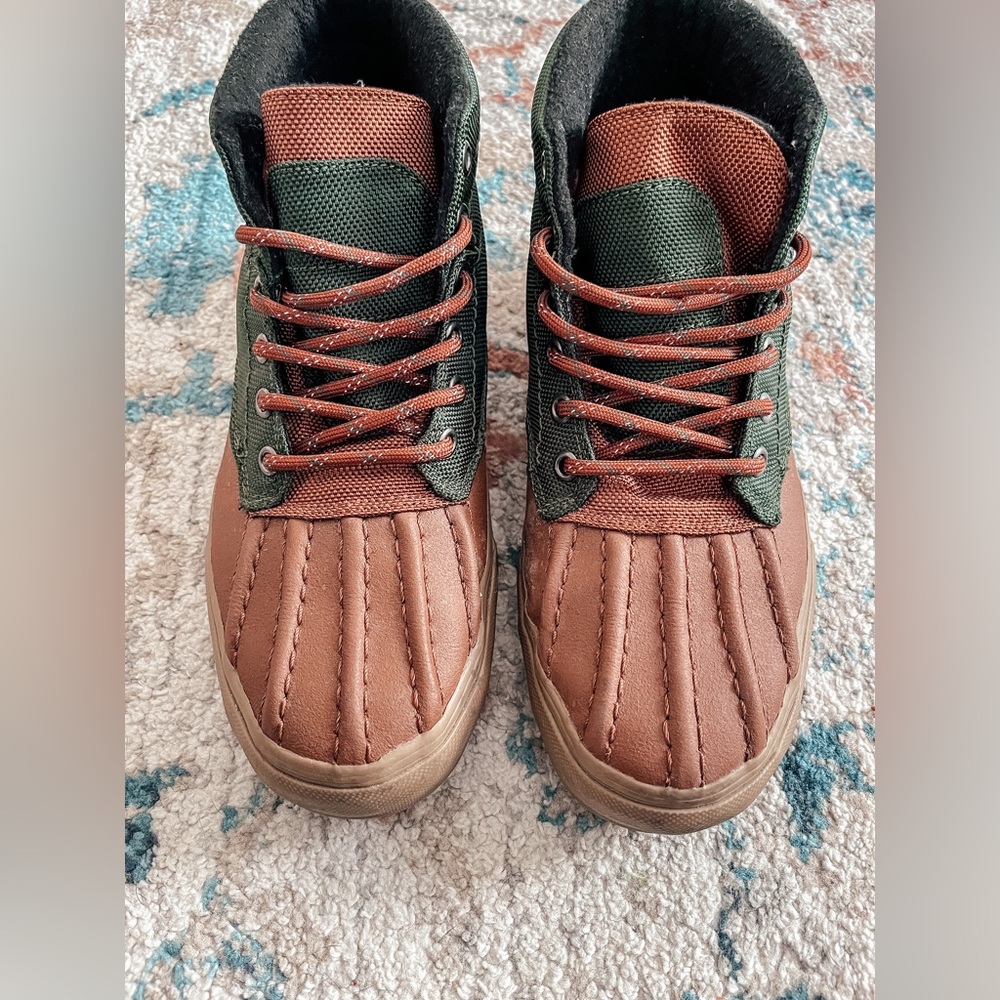 vans | high top duck boots. Runs a bit bigger than Vans slip on shoes.